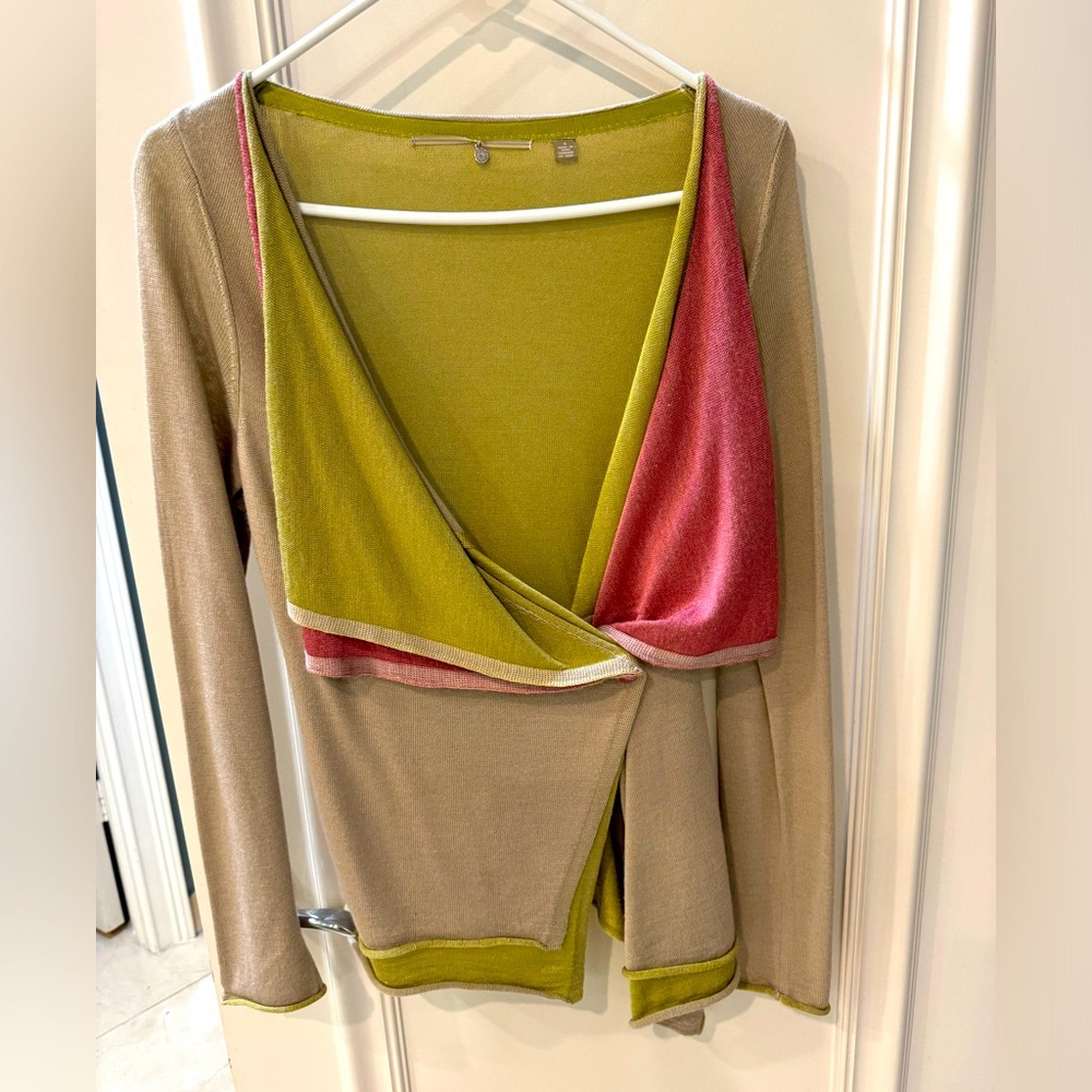 Beautiful cardigan with 1 button closure. Like new, great condition.